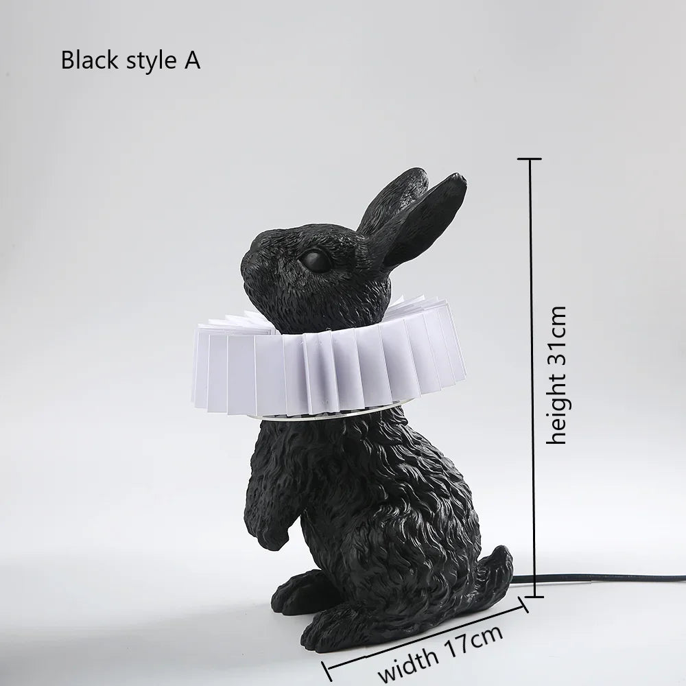 lampe de table créative en résine avec écharpe de lapin décorative.