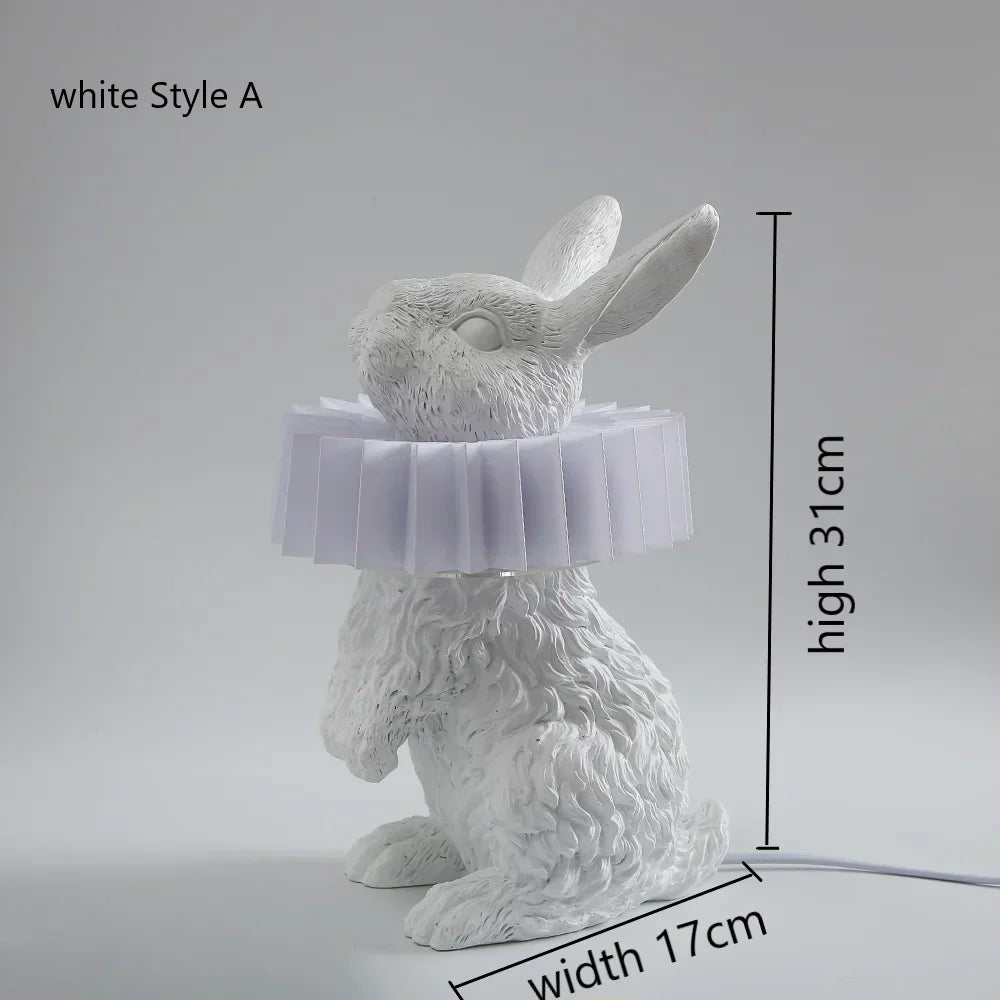 lampe de table créative en résine avec écharpe de lapin décorative.